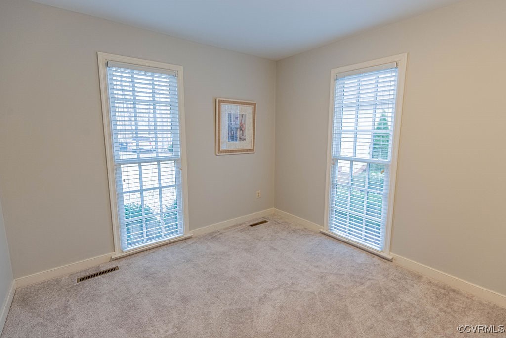 3511 Old Gun Road West Midlothian, VA 23113 - Photo 31 of 50 an empty room with windows
