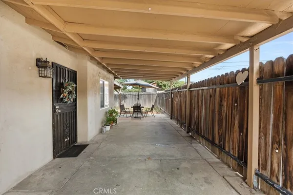 a view of a storage room with wooden walls