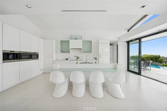 a kitchen with a stove and a microwave