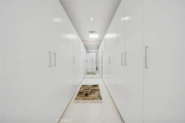 a view of workspace with furniture and window