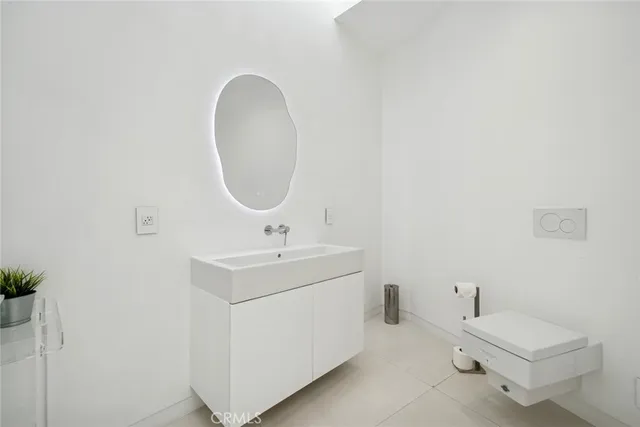 a room with pool table and a chandelier