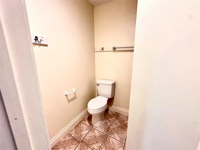a bathroom with a toilet