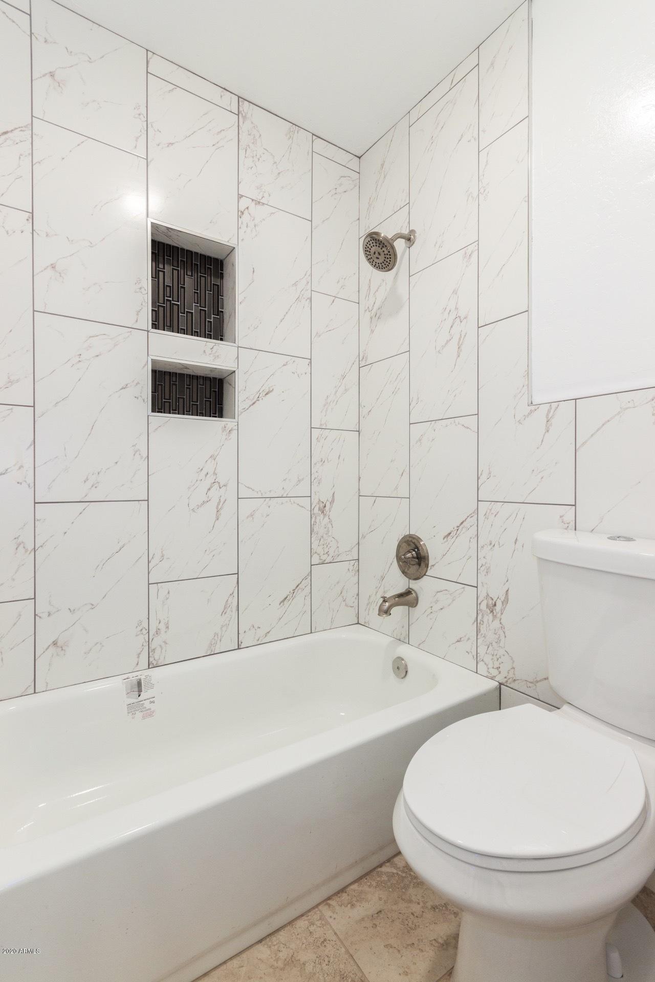 1126 West Elliot Road, Unit 2043 Chandler, AZ 85224 - Photo 13 of 25 New tile in shower