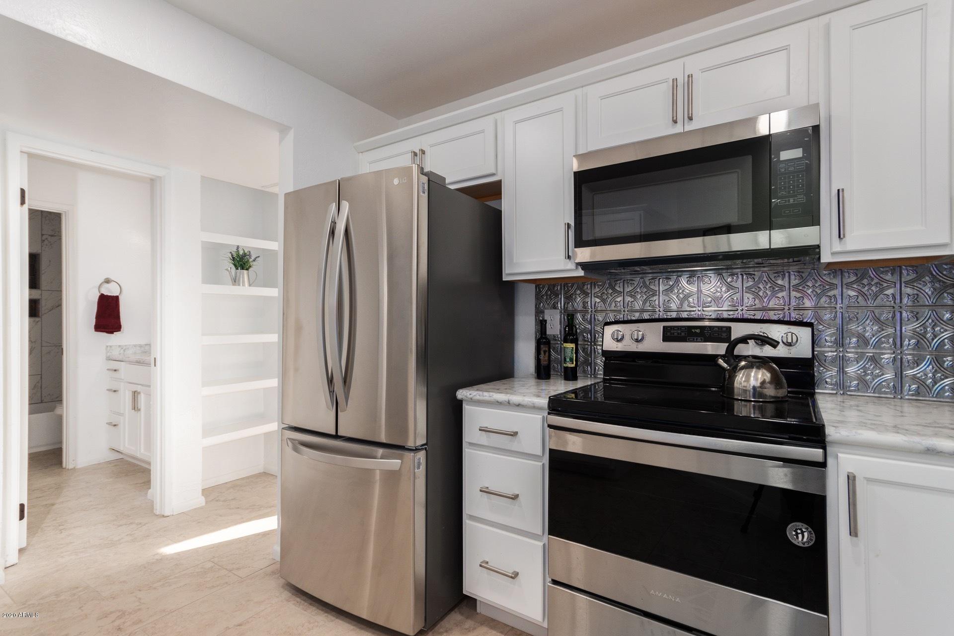 1126 West Elliot Road, Unit 2043 Chandler, AZ 85224 - Photo 16 of 25 New stainless steel appliances