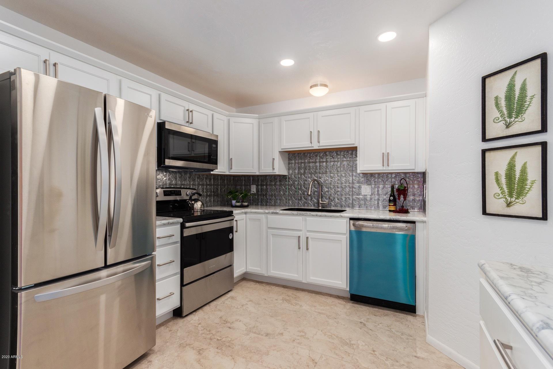 1126 West Elliot Road, Unit 2043 Chandler, AZ 85224 - Photo 3 of 25 New Kitchen flooring