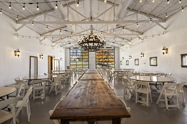 a view of a swimming pool with an outdoor seating and yard