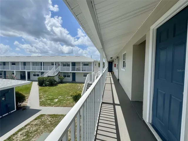 a view of a house with many windows