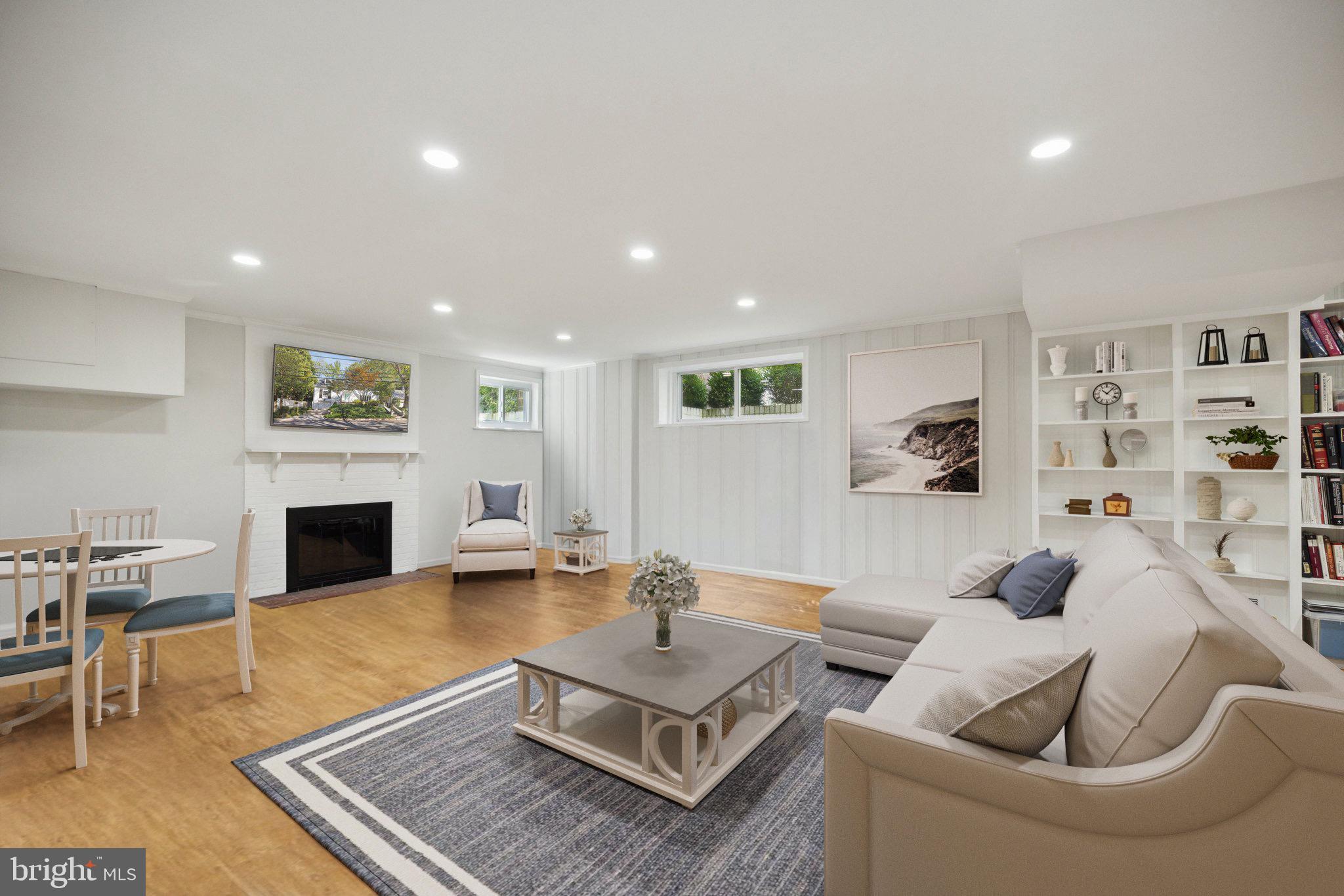 4555 W Street Northwest Washington, DC 20007 - Photo 25 of 34 a living room with furniture and a fireplace