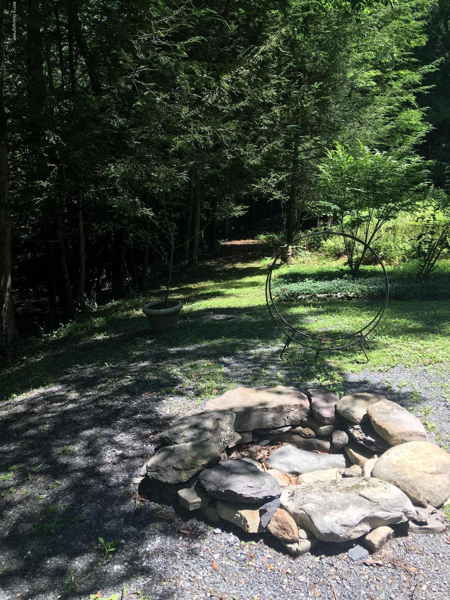 238 Quiet Valley Road Stroudsburg, PA 18360 - Photo 3 of 13 fire pit:deer path