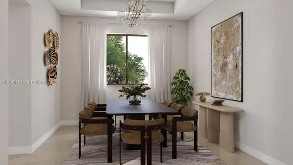 a view of a dining room with furniture and window