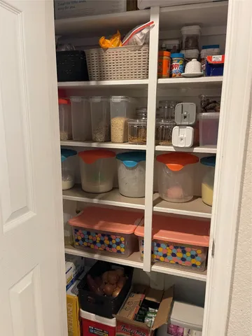 a room with wooden shelves