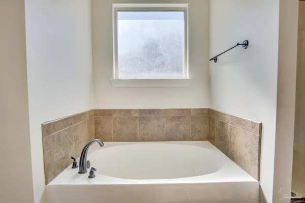 a bathroom with a bathtub