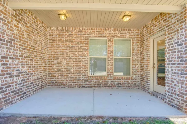 a house with yard in front of it