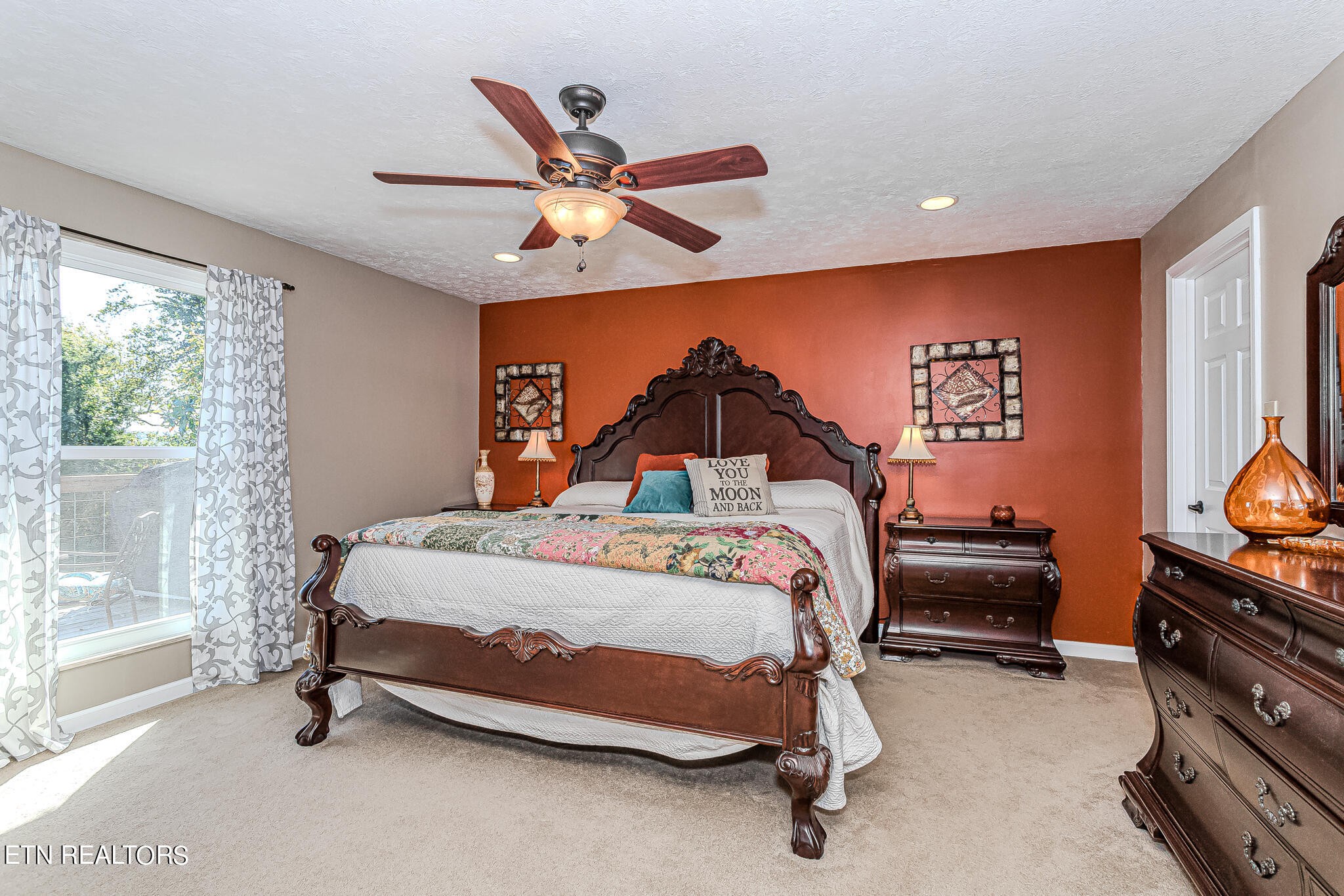 6011 Renee Road Corryton, TN 37721 - Photo 25 of 56 a bedroom with a bed and a chandelier