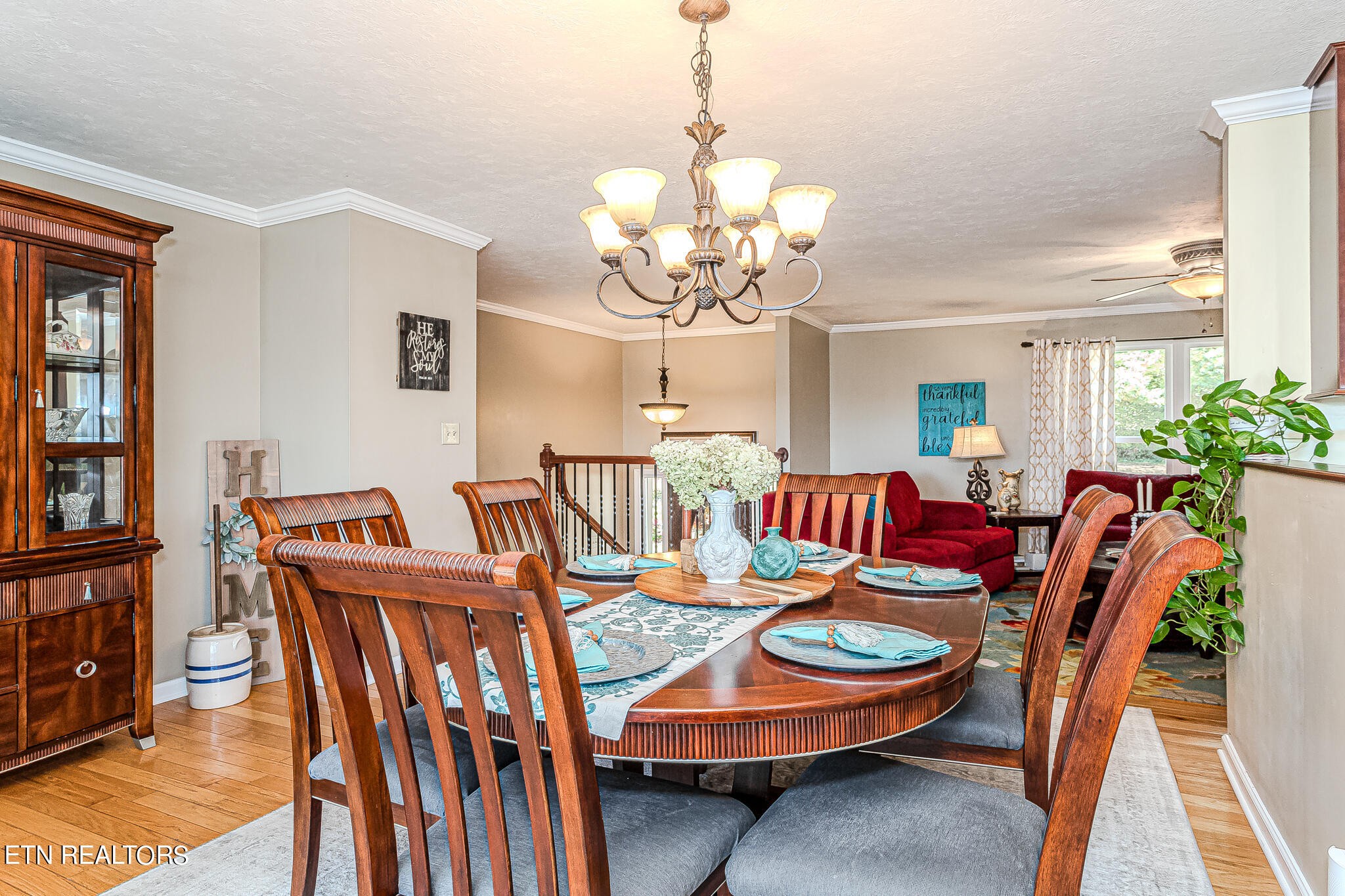 6011 Renee Road Corryton, TN 37721 - Photo 8 of 56 a dining room filled chandelier and wooden floor