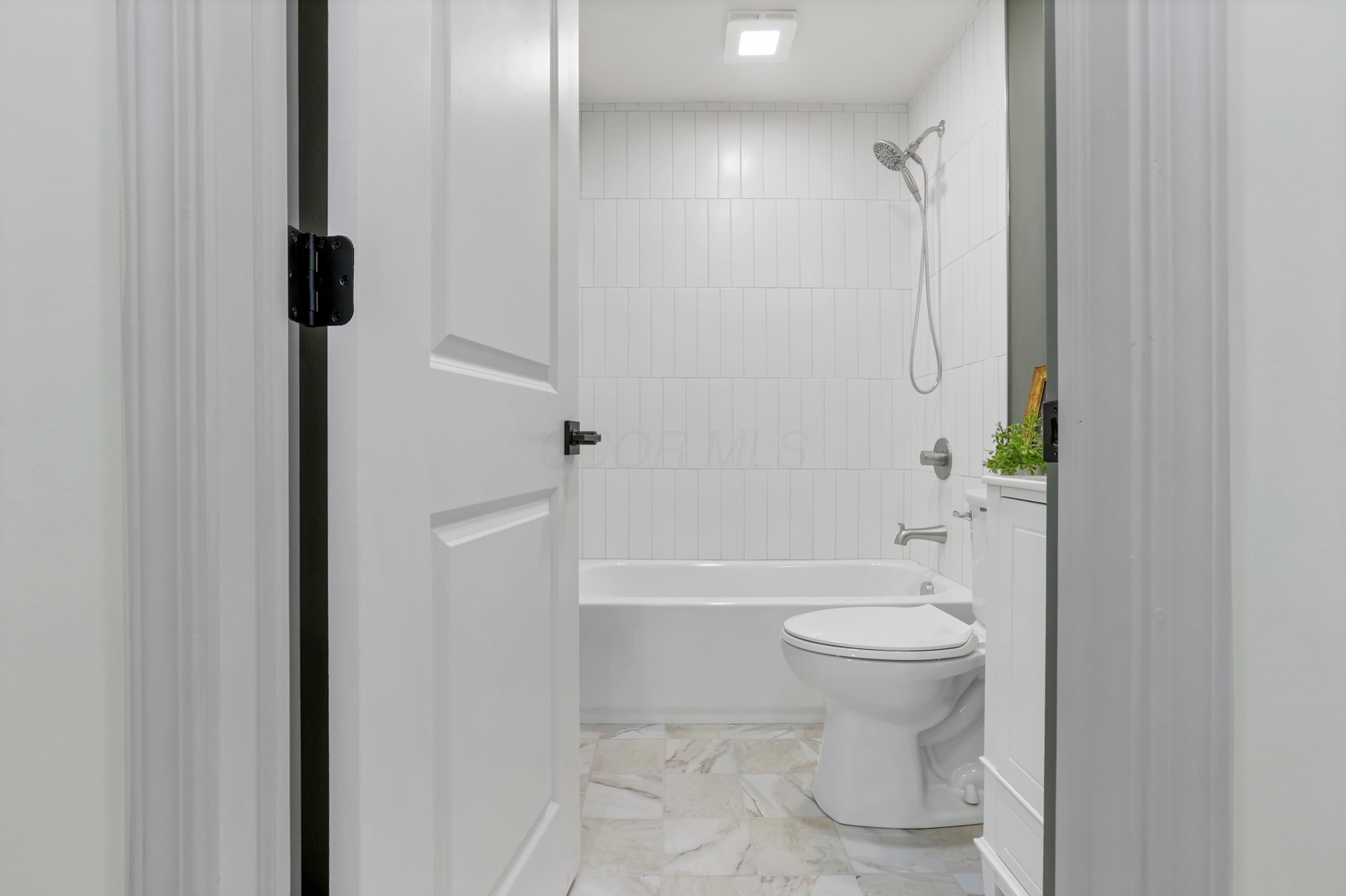 1285 Kingsgate Road Columbus, OH 43221 - Photo 31 of 56 Full bathroom number 2 - on first floor for convenience!