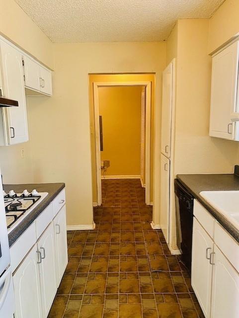 6009 Deborah Lane Watauga, TX 76148 - Photo 11 of 13 a kitchen with a sink and a refrigerator