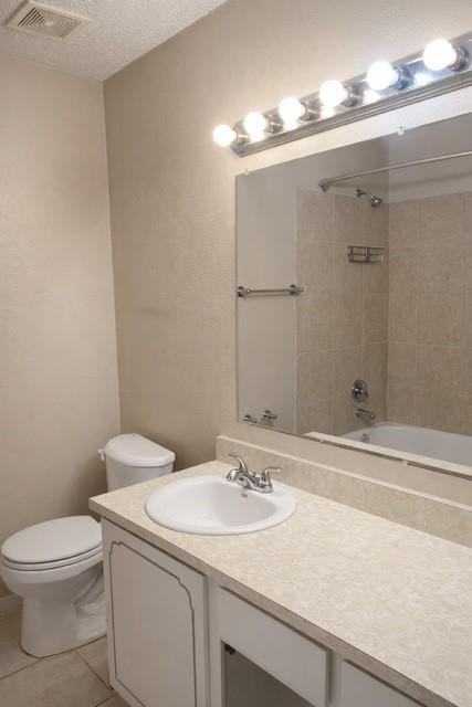 6009 Deborah Lane Watauga, TX 76148 - Photo 13 of 13 a bathroom with a sink a toilet and shower