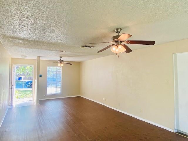 6009 Deborah Lane Watauga, TX 76148 - Photo 4 of 13 a view of empty room with wooden floor