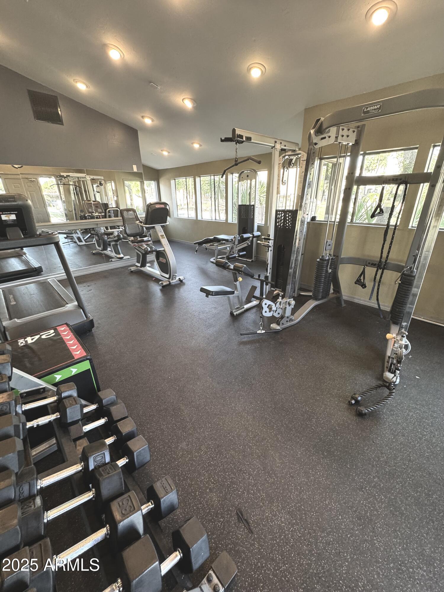 3825 East Camelback Road, Unit 152 Phoenix, AZ 85018 - Photo 21 of 28 a view of a room with gym equipment