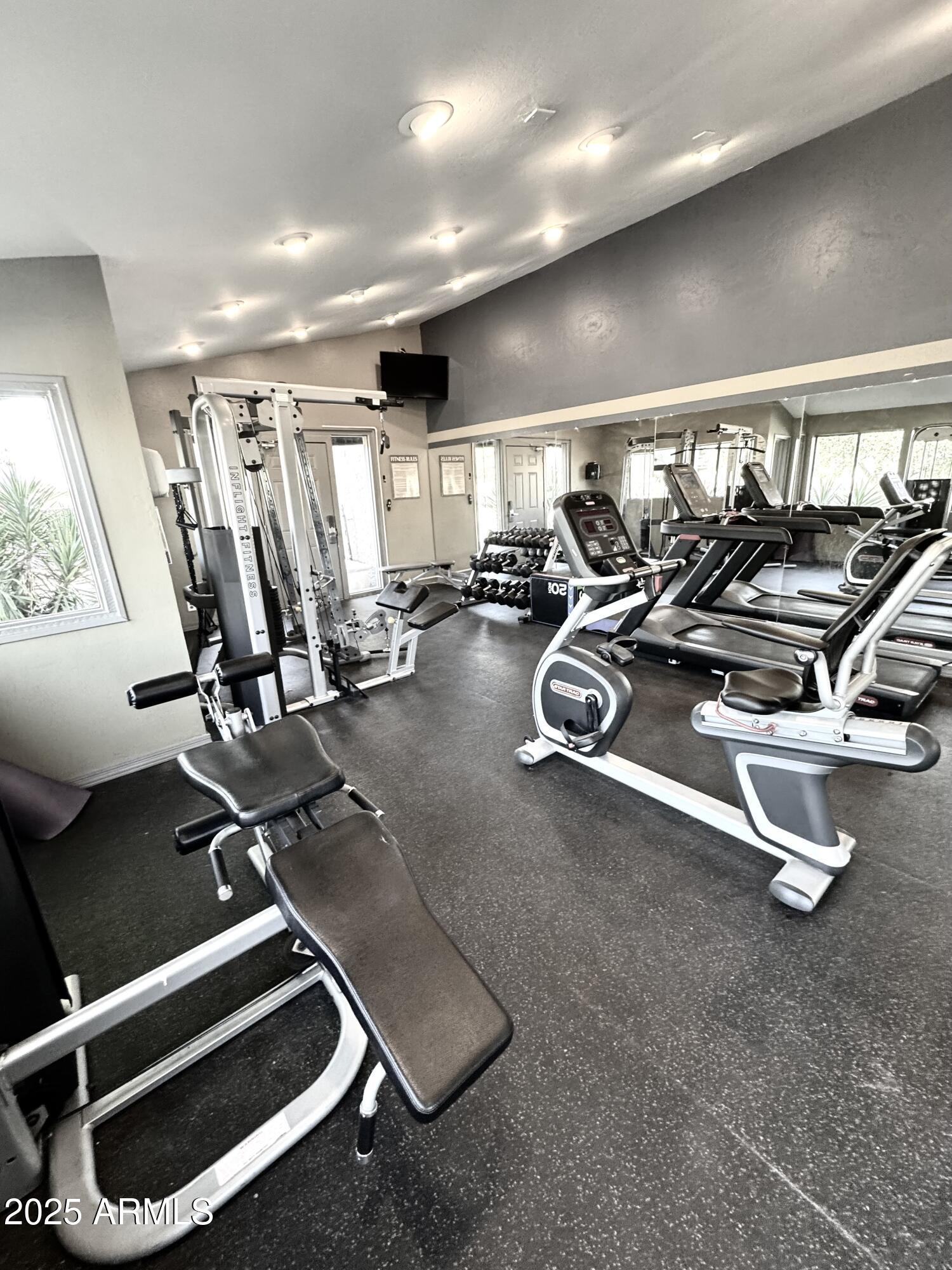 3825 East Camelback Road, Unit 152 Phoenix, AZ 85018 - Photo 22 of 28 a view of a room with gym equipment