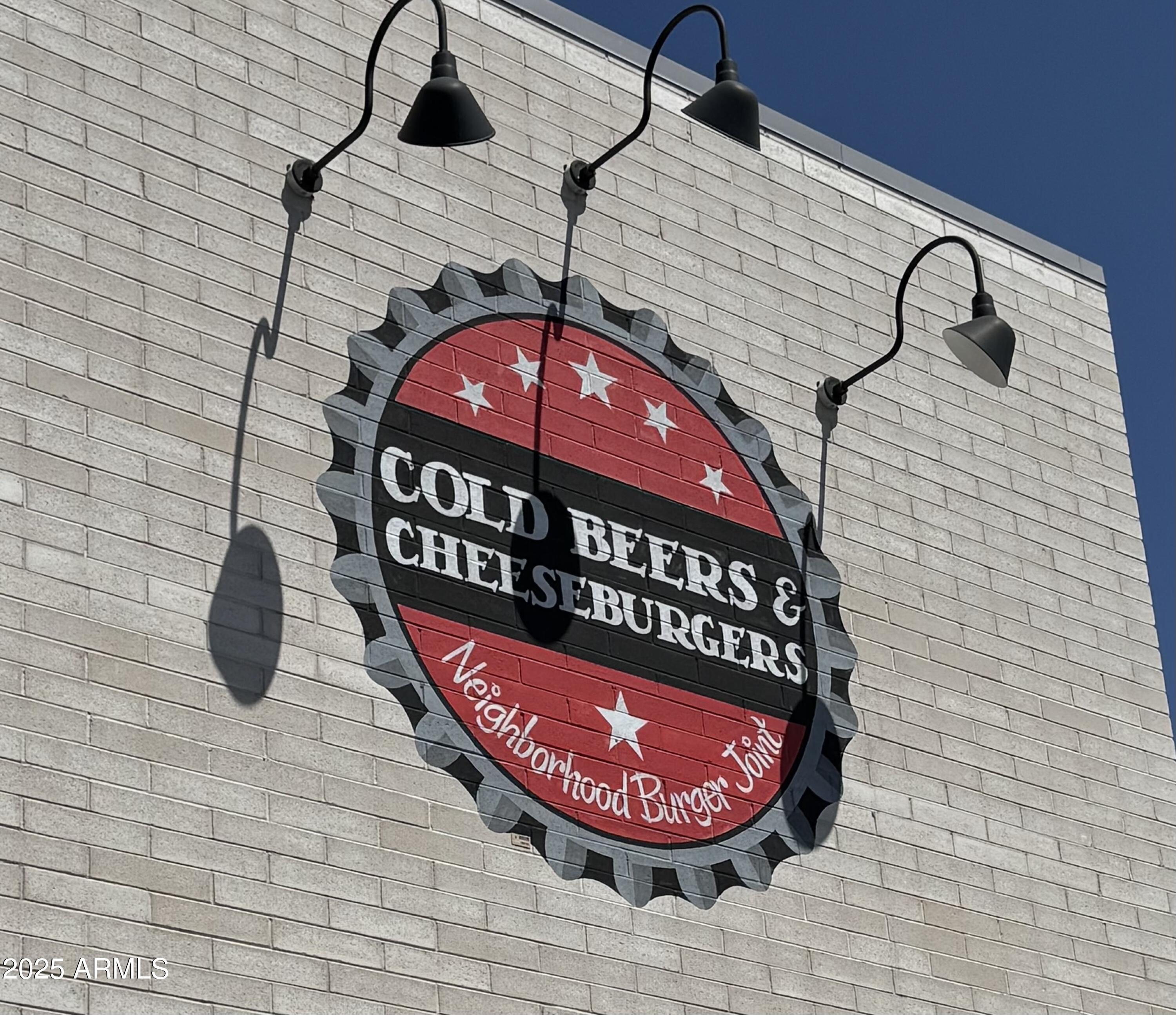 3825 East Camelback Road, Unit 152 Phoenix, AZ 85018 - Photo 27 of 28 a front view of a house with porch
