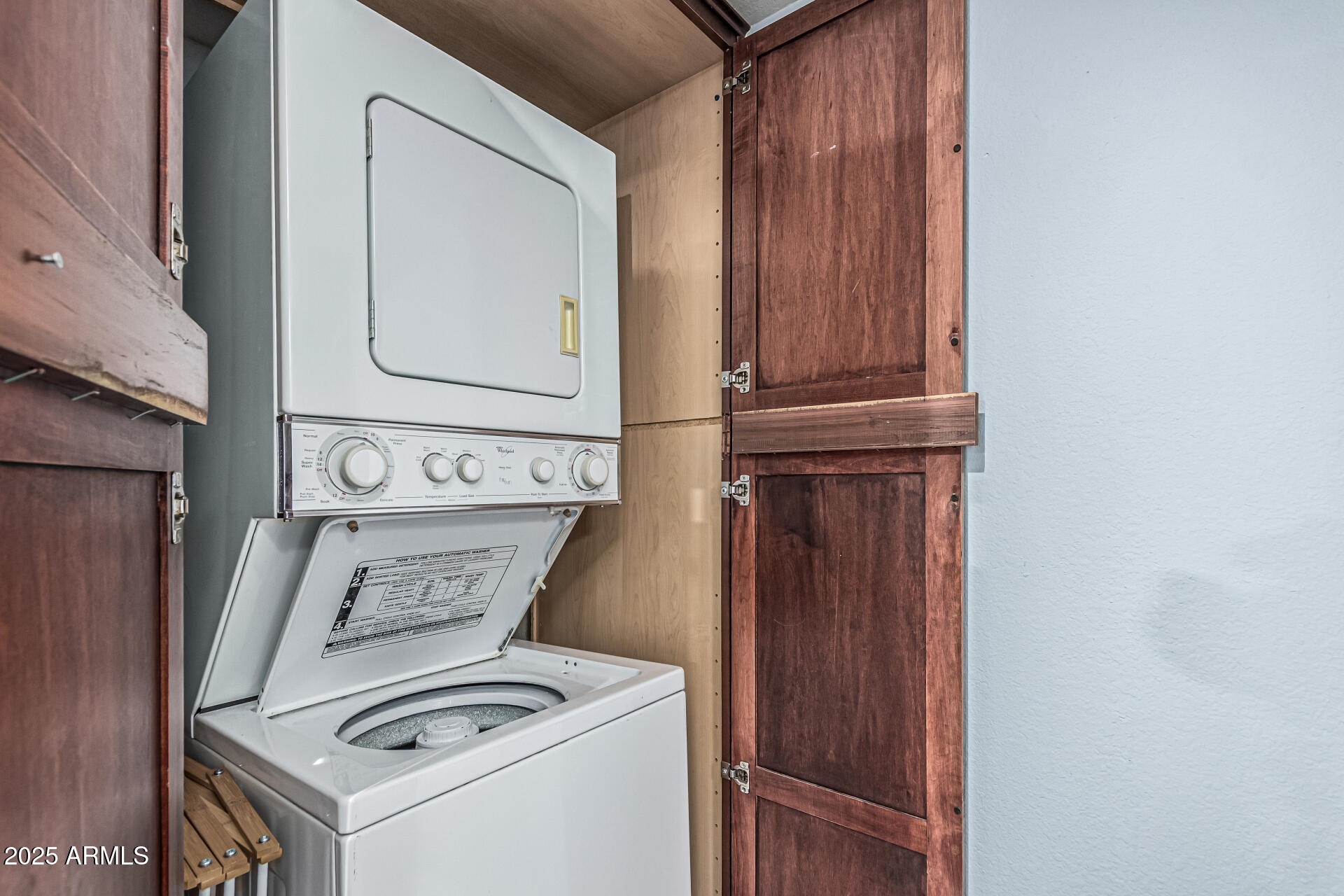 3825 East Camelback Road, Unit 152 Phoenix, AZ 85018 - Photo 6 of 28 a utility room with dryer and washer