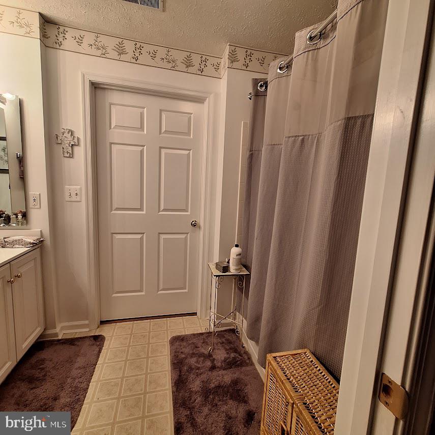 9609 Haven Farm Road, Unit 9609H Perry Hall, MD 21128 - Photo 16 of 21 Serene bathroom retreat with elegance.