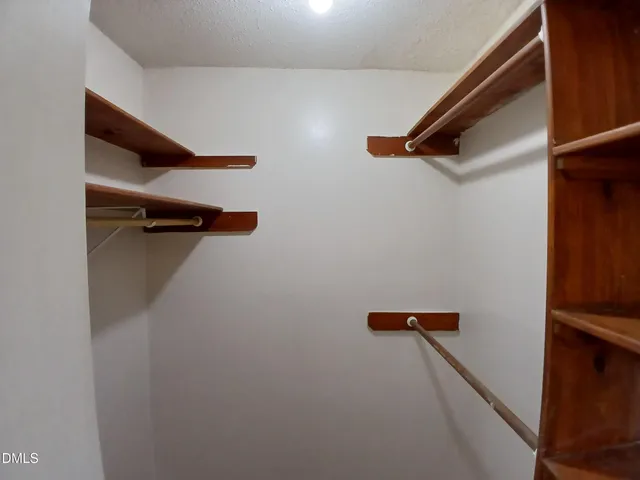 a view of a room with rack on the wall