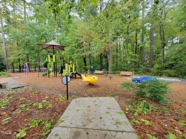 a view of a park with swings