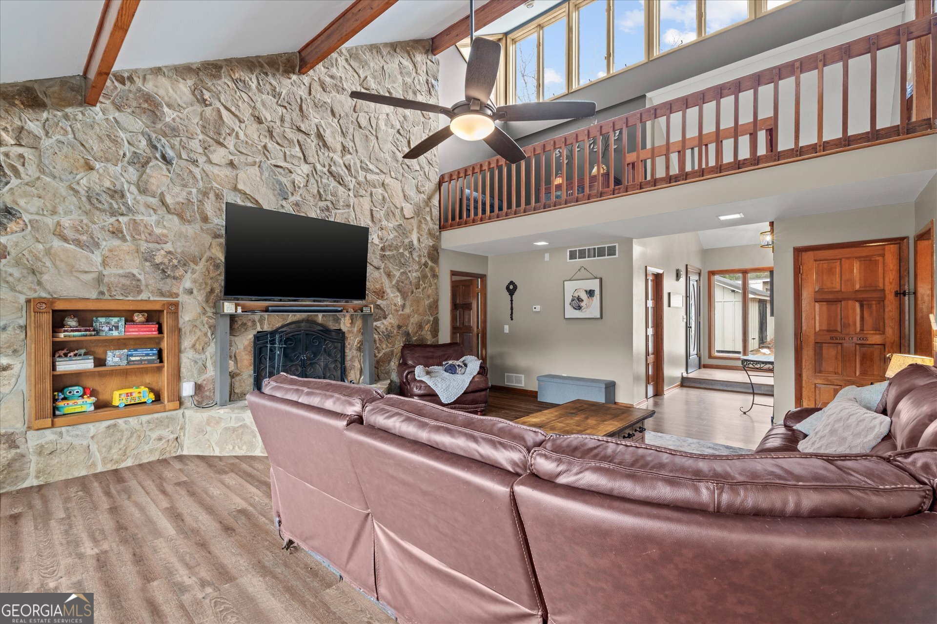 620 Smyrna Church Road Carrollton, GA 30117 - Photo 11 of 68 a living room with furniture and a flat screen tv