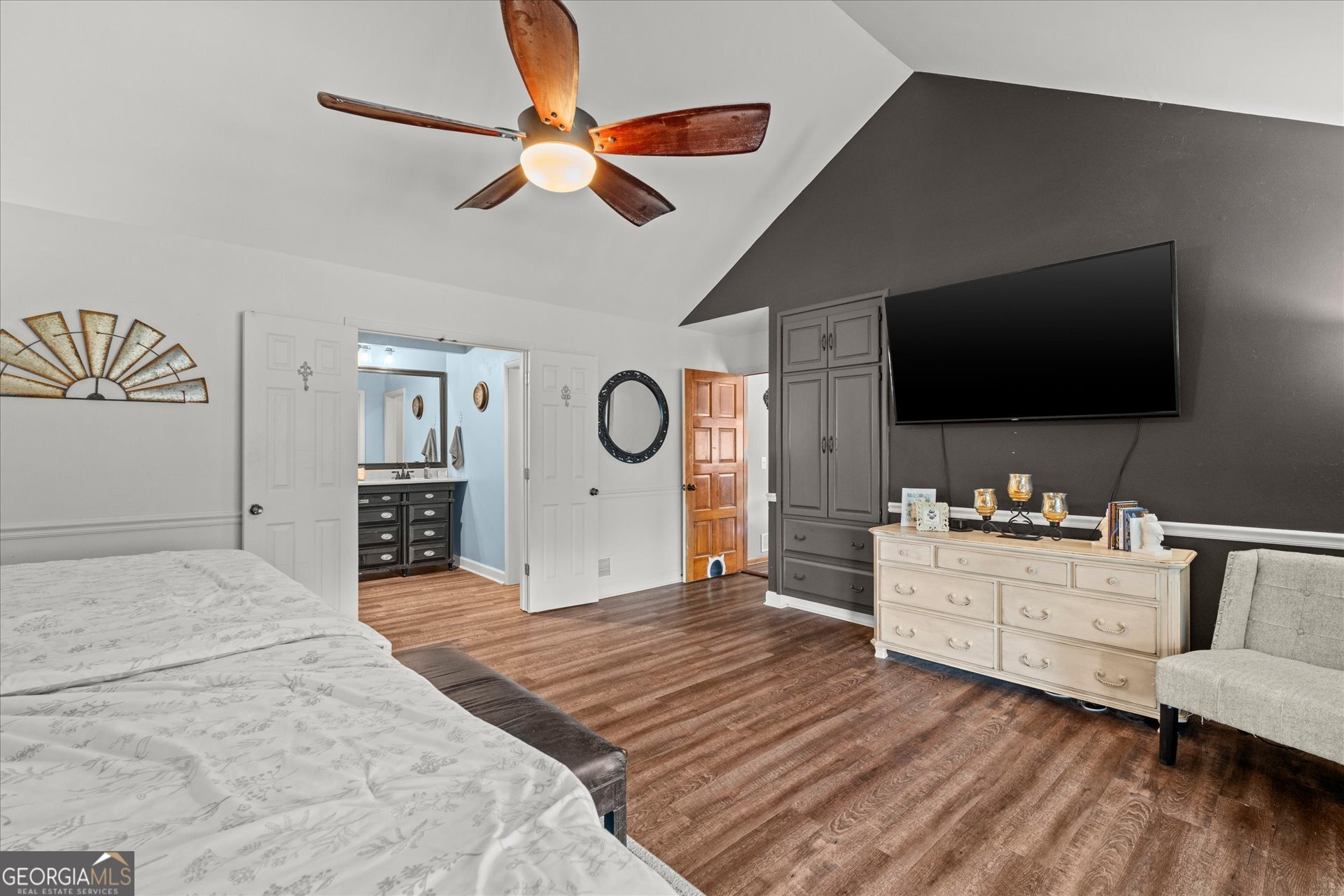 620 Smyrna Church Road Carrollton, GA 30117 - Photo 24 of 68 a bedroom with furniture and a flat screen tv