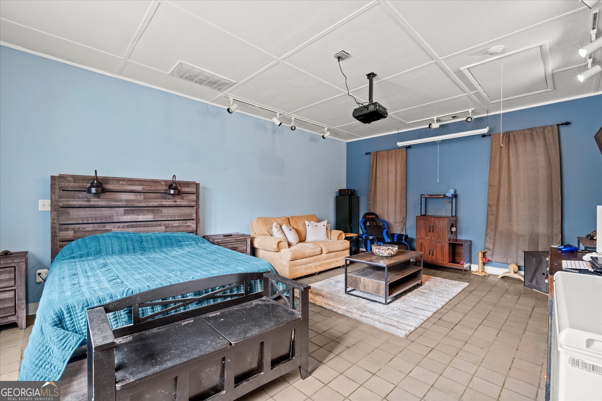 620 Smyrna Church Road Carrollton, GA 30117 - Photo 32 of 68 a bedroom with furniture and wooden floor