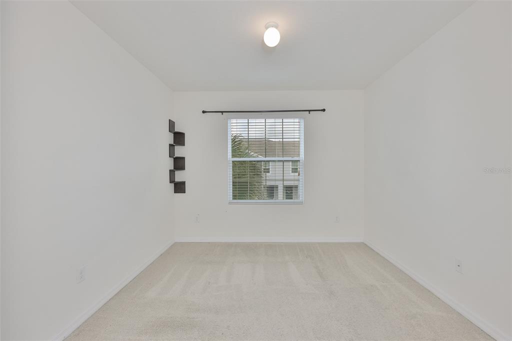 8969 Indigo Trail Loop Riverview, FL 33578 - Photo 35 of 41 an empty room with a window