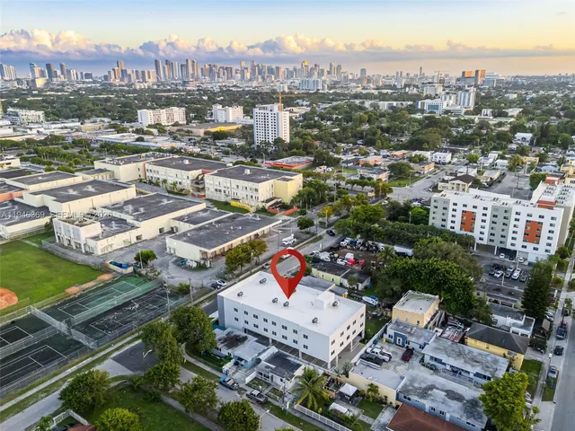 an aerial view of a city with lots of residential buildings