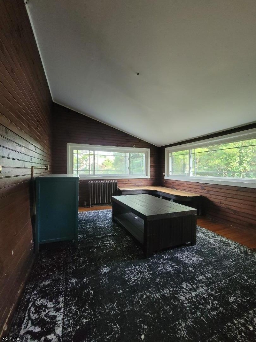 71 Montclair Avenue, Unit 2B Montclair, NJ 07042 - Photo 2 of 10 a room with lots of windows and couches