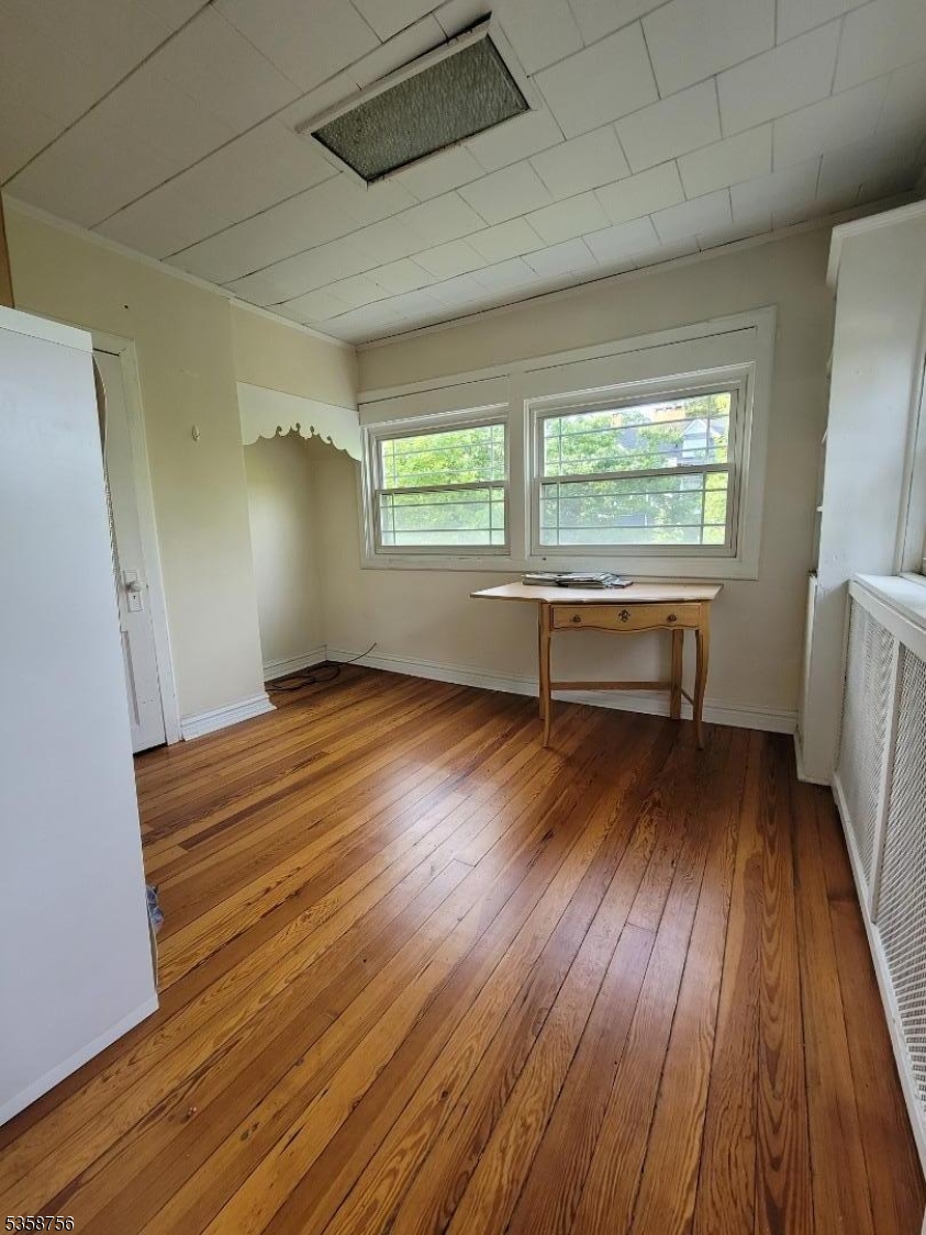71 Montclair Avenue, Unit 2B Montclair, NJ 07042 - Photo 4 of 10 a view of entryway with wooden floor
