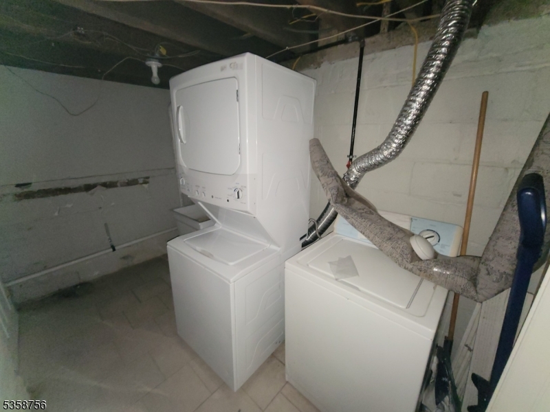 71 Montclair Avenue, Unit 2B Montclair, NJ 07042 - Photo 9 of 10 a utility room with dryer and washer