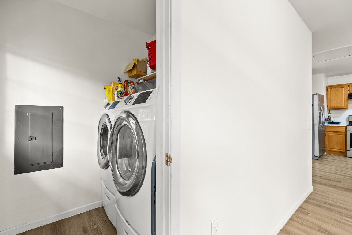 6110 Devonshire Cove Austin, TX 78723 - Photo 25 of 31 a utility room with dryer and washer