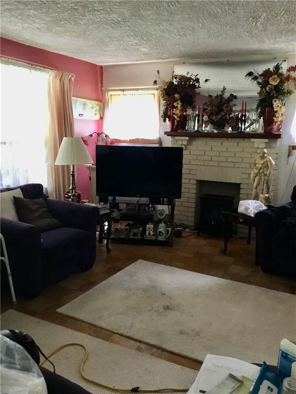743 Butler Road Kittanning, PA 16201 - Photo 8 of 14 Expansive living room with decorative fireplace