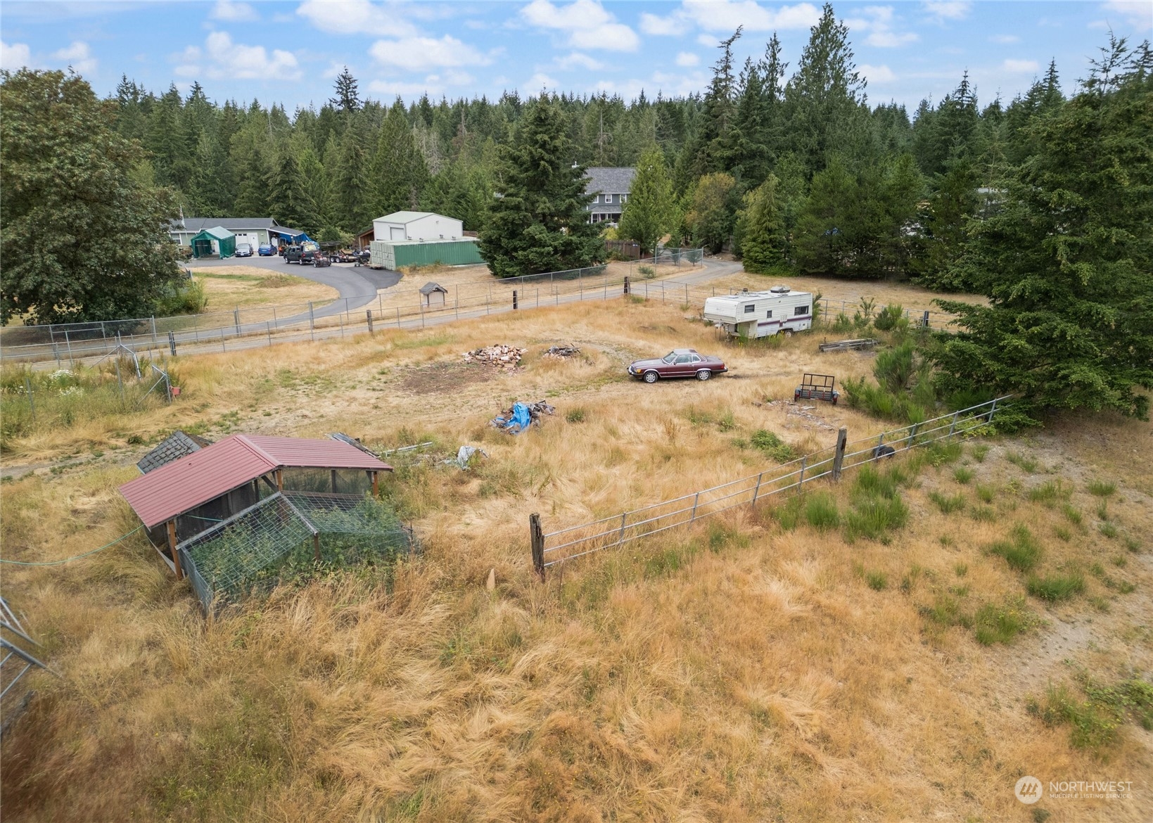 a view of a yard with an outdoor space