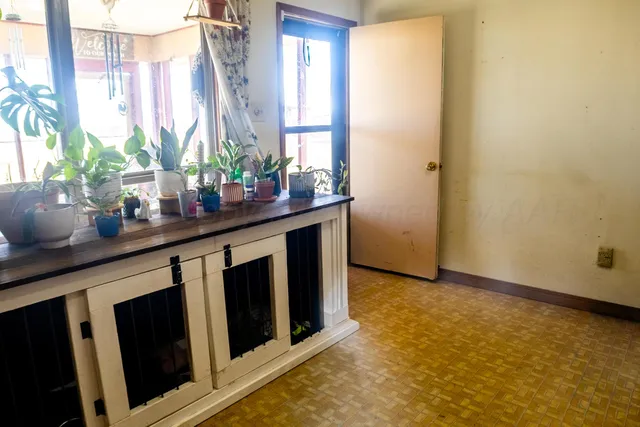 a kitchen with sink and window