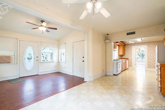 a view of a livingroom with wooden floor