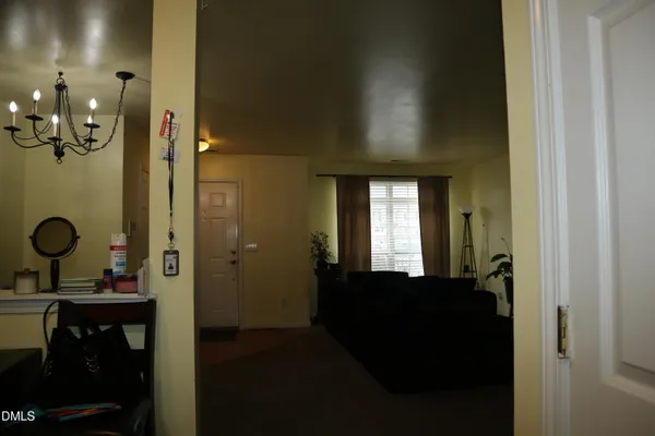 a view of a bathroom from the hallway