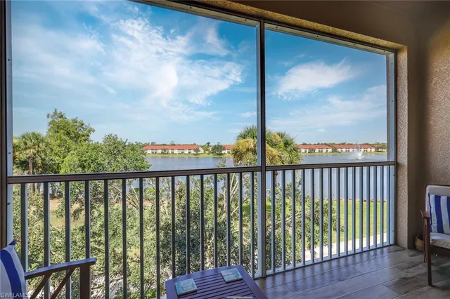 a swimming pool with outdoor seating and yard