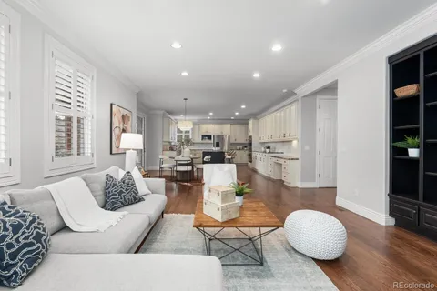 a living room with furniture fireplace and a flat screen tv