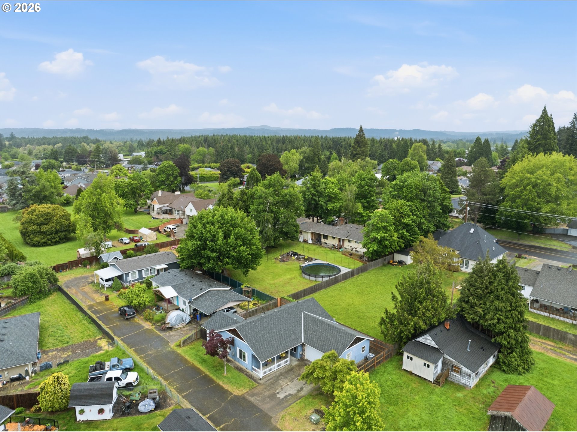 105 Toliver Road Molalla, OR 97038 - Photo 28 of 34 an aerial view of a house with a garden