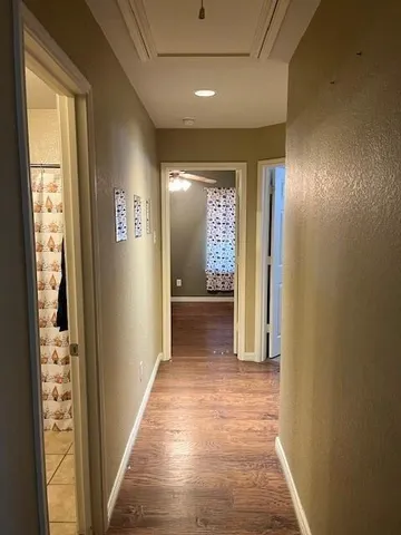 a view of hallway with windows