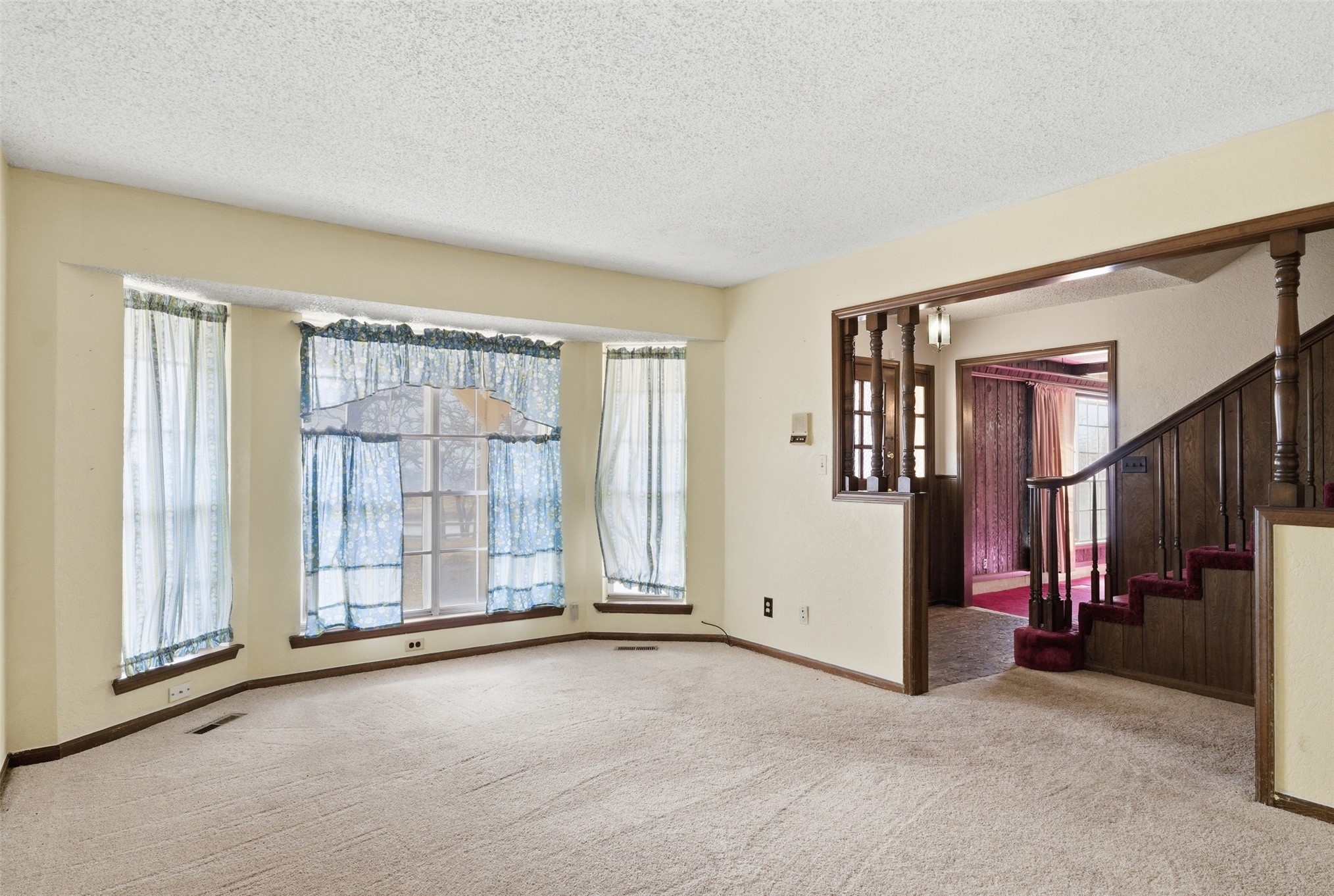 17875 East 589 Road Inola, OK 74036 - Photo 57 of 73 House #2 Bay window with three panes, wood trim, and a carpeted floor