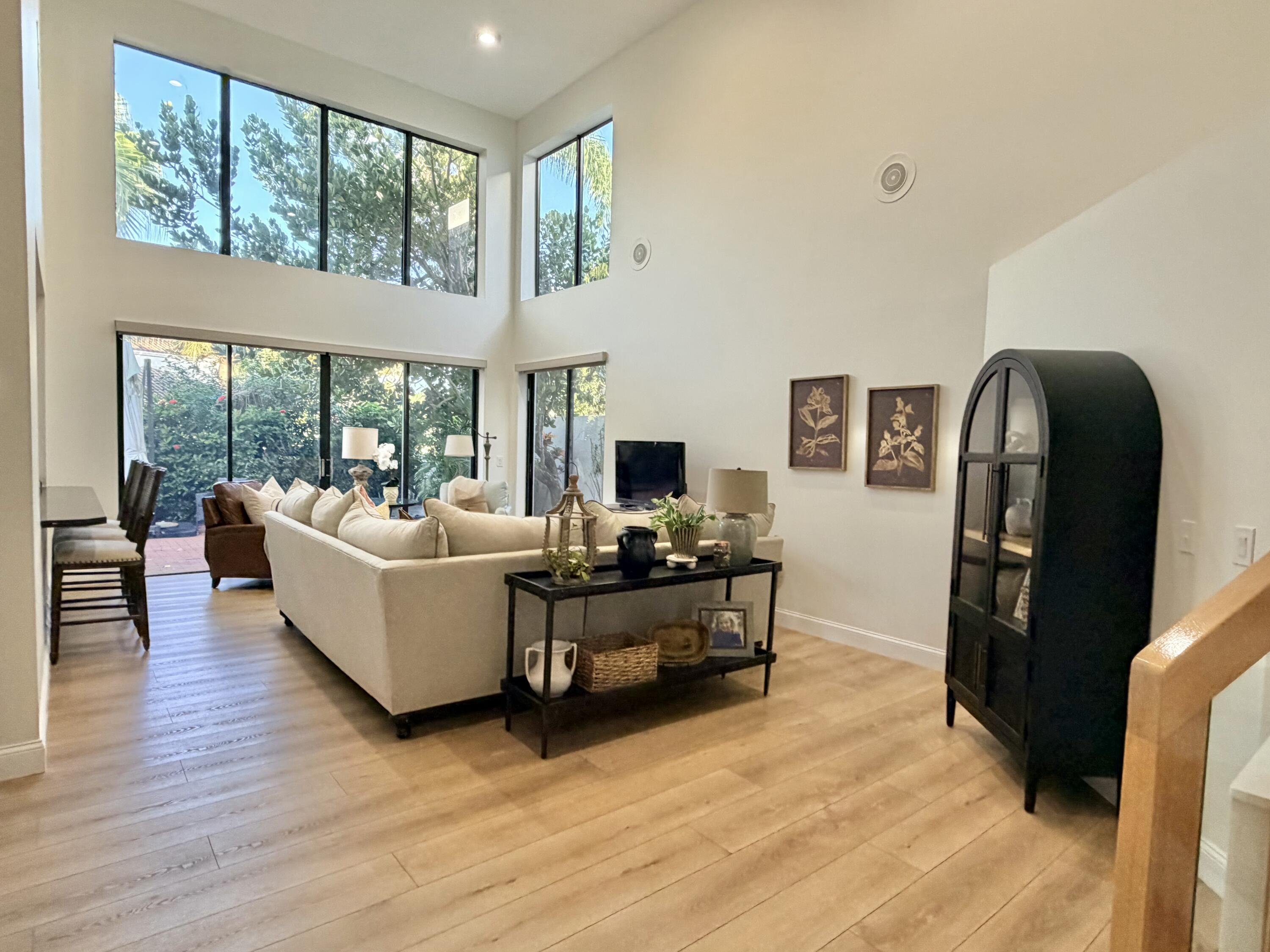 22728 Caravelle Circle Boca Raton, FL 33433 - Photo 23 of 39 a living room with furniture and a flat screen tv